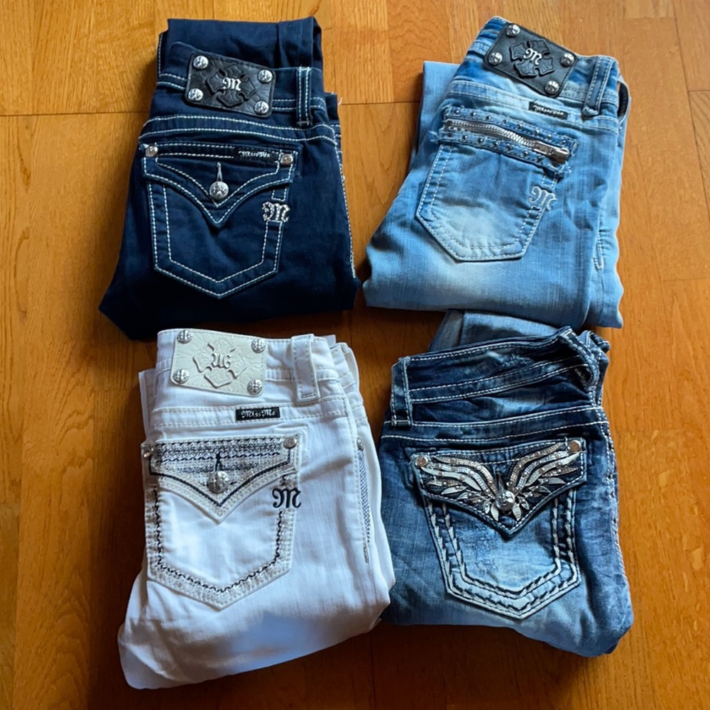 4 pairs of Miss Me low rise Skinny jeans